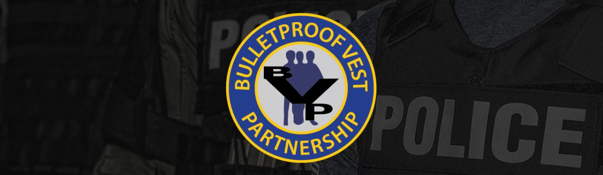 Image of Police in background with Bulletproof Vest Partnership Program BVP logo in center