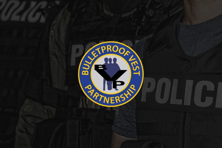 Image of Police in background with Bulletproof Vest Partnership Program BVP logo in center